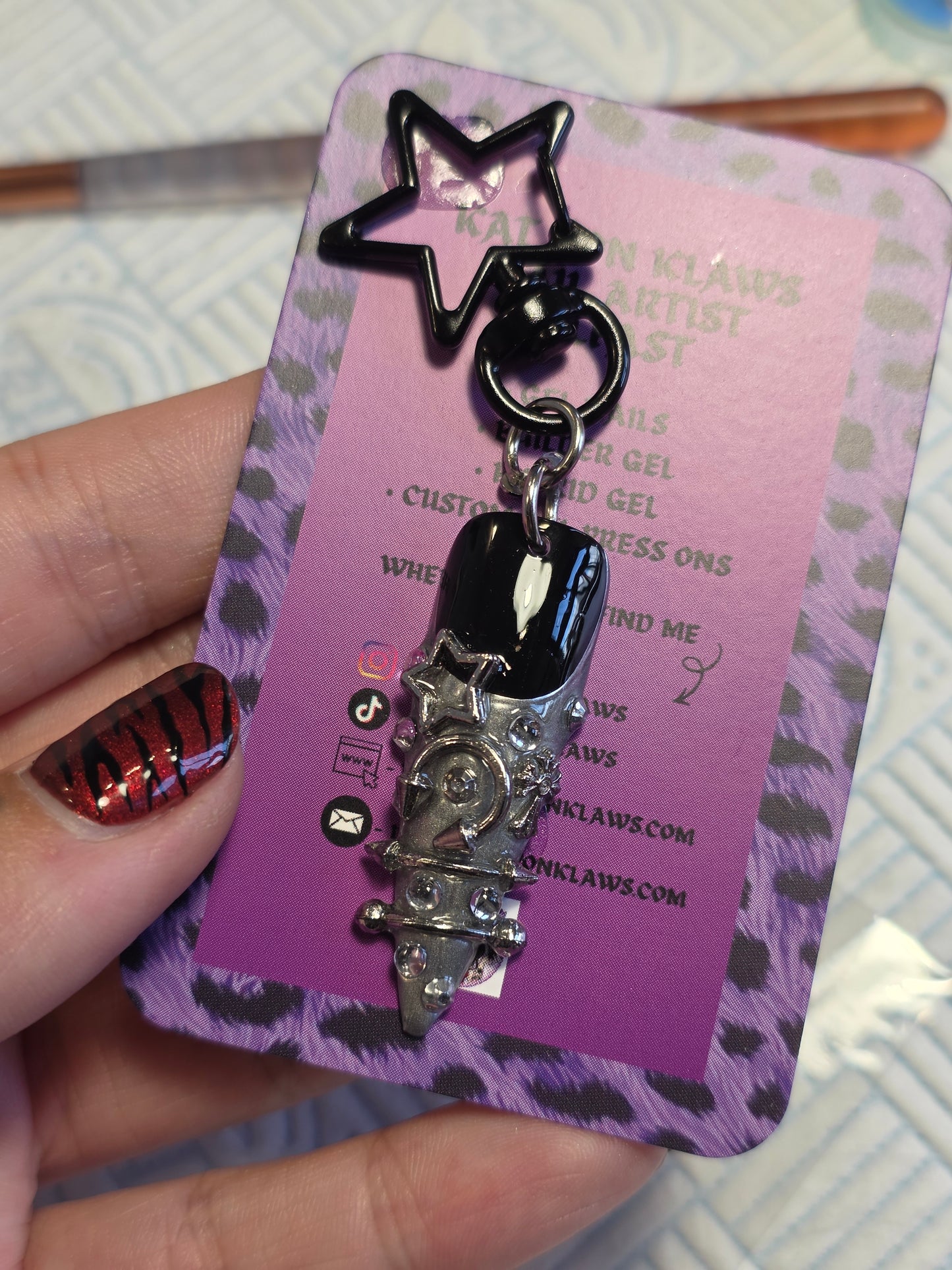 Nail themed keychains